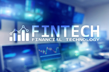 Fototapeta premium FINTECH - Financial technology, global business and information Internet communication technology. Skyscrapers background. Hi-tech business concept.