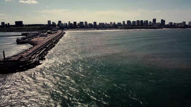 Mar del Plata harbor Argentina – 4k drone video of Cristo Salvador and Playa Grande on the coast in spring time.  Buenos Aires Capital Federal district  