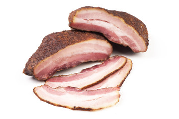 Dried pork meat with slices, isolated on white background.