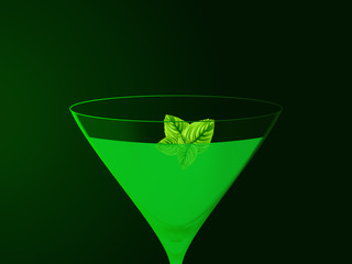 Bebida verde num fundo escuro