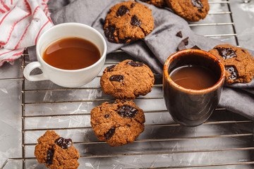 Breakfast cookies with chocolate and cocoa, gray background. Clean eating concept.