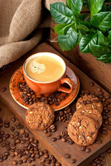 Cup of coffee with cookies
