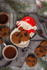 Christmas cookies with chocolate and cocoa, top view. Christmas background concept.