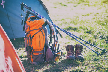 backpack, tent, boots and Trekking poles