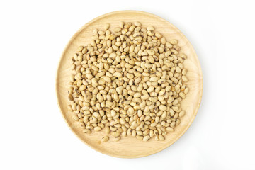 Roasted Soy in Round Wood Dish isolated on White Background. Top View.