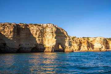 Fototapeta na wymiar Algarve Seashore and Caves. Exposure done in a boat tour in the Lagoa seashore, Algarve, Portugal
