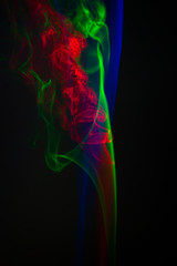Colorful abstract smoke pattern on black background