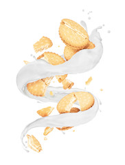 Crushed biscuits with milk splashes in a swirling shape on white background