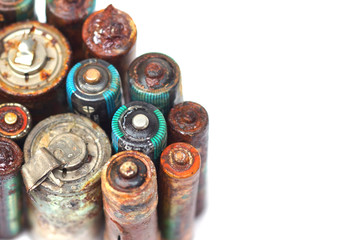 Old battery leak isolated on white background with copy space to add text