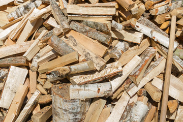 The wood chopped up are in a stack