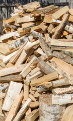 The wood chopped up are in a stack