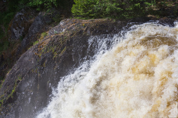 Stormy waterfall in a dense forest