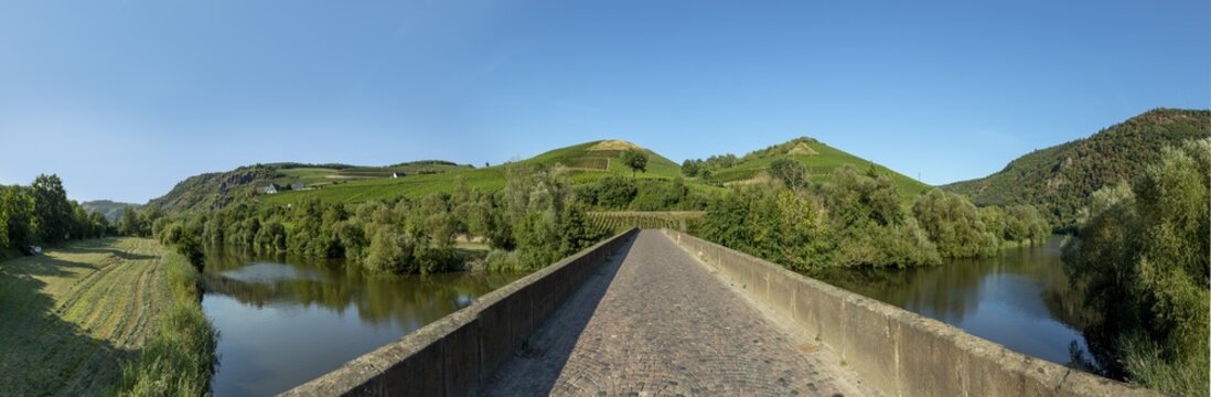  Luitpold bridge over river Nahe in Oberhausen with vineyards and blue sky