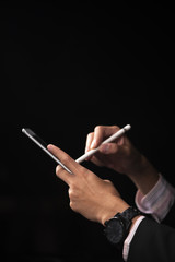 hand of businessman emotion on black background