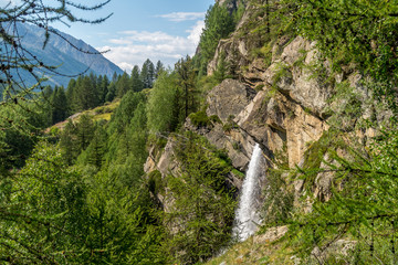 waterfall in the mountains among the rocks