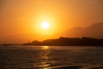 Fototapeta na wymiar Sunset, Santa Barbara, California, Rincon Beach, sea, pacific ocean, orange