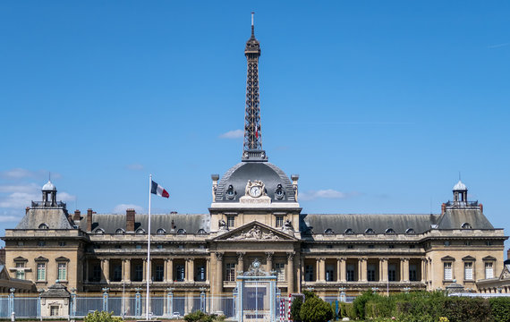 The Military School backyard entrance (Ecole Militaire) with Eiffel tower in background - Paris, France.