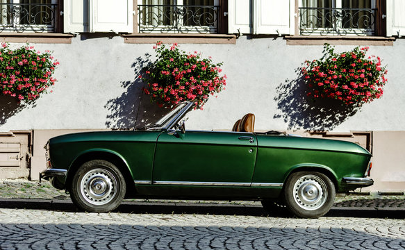 Beautiful Retro Green Car On The Street, Sunny Day