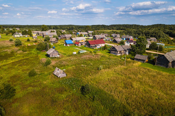 Bird's eye view of Ladva village, green fields and Vepsian forest. Border Leningrad region and Karelia republic, Russia.