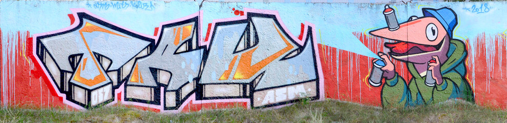 Full and acomplished graffiti artwork. The old wall decorated with paint stains in the style of...