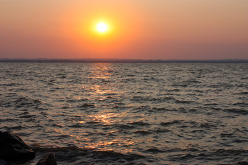 vivid sunset over the Balaton Lake, Hungary.