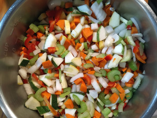 Many vegetables chopped up in an instant pot,