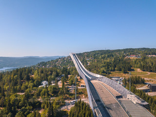Aerial of Holmenkollen  Ski Museum and Ski Jump Tower in Oslo, Norway.  - 218707699
