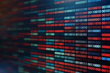 Computer virus infection. Row of binary codes randomly colored red and blue on black screen monitor...