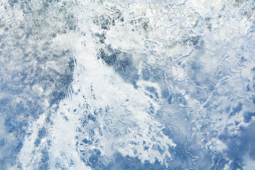 The texture of the ice. The frozen water.Winter background   