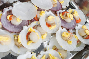 Fresh scallop with butter and garlic, seafood preparation
