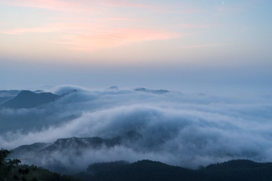 Fototapeta morning glow and clouds fog in the mountains