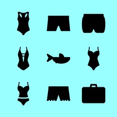 beach vector icons set. shark, suitcase, swimsuit and short in this set