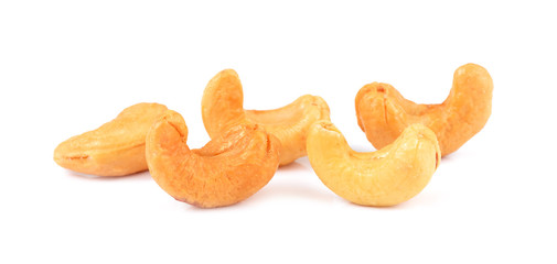 cashew nuts heap on white background.