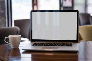 Obraz na płótnie Canvas mock up Using laptop with blank screen computer modern