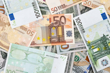 A lot of euro and american dollars banknotes. Background