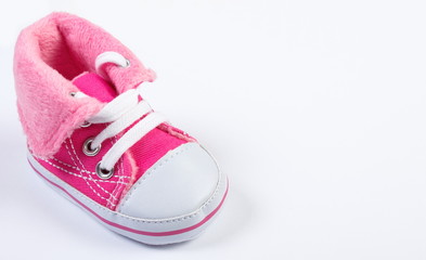 Pair of baby shoe on white background, expecting for baby, place for inscription