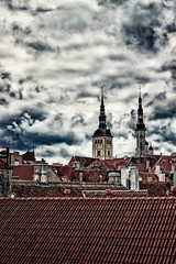 Obraz premium Church Towers Behind The Rooftops