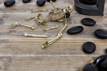 Halloween holiday background with skull and skeleton,View from above