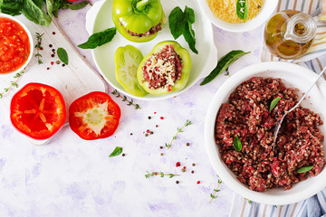 Ingredients for preparation of stuffed pepper with minced meat and buckwheat porridge. Tasty food. Flat lay. Top view