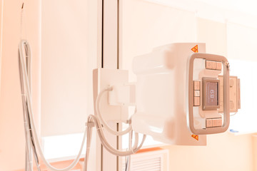 X-Ray machine close up in contemporary medical center.device with x-ray table in a hospital.X-ray equipment .operating room with X-ray medical scan.Selective focus.Copy space