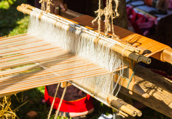 Household Loom weaving - Detail of weaving loom for homemade silk or textile production of Thailand 