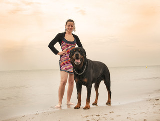 woman and rottweiler