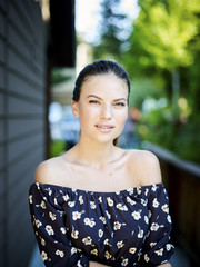 Outdoor atmospheric fashion photo of young beautiful lady