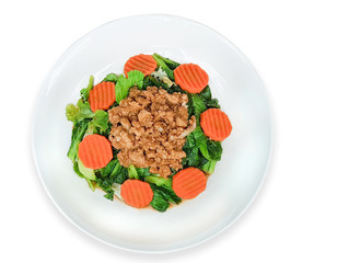 Fried chinese kale with pork chops , isolated on white background with clipping path