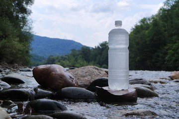 Picture of a plastic bottle with water.