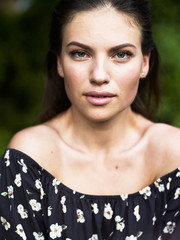 Outdoor atmospheric fashion photo of young beautiful lady