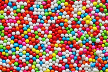 Fototapeta na wymiar colorful sparkling candy ball background.