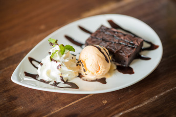 Chocolate vanilla milk ice cream on wood table