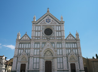 Fototapeta premium Florence,Italy-July 26,2018: Piazza Santa Croce and Basilica di Santa Croce di Firenze in the blazing midday sun