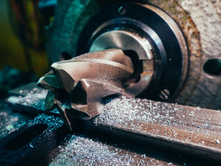 Old geeen milling machine, closeup, metalworking